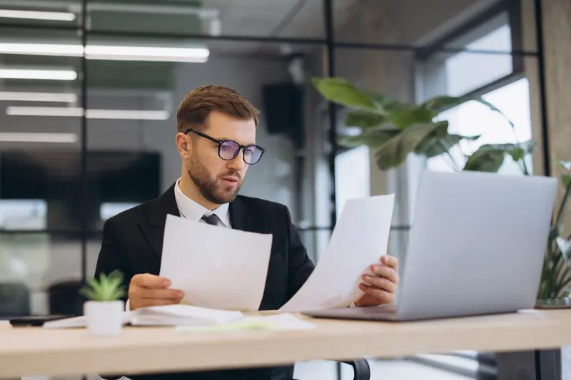 Professional reviewing contract documents